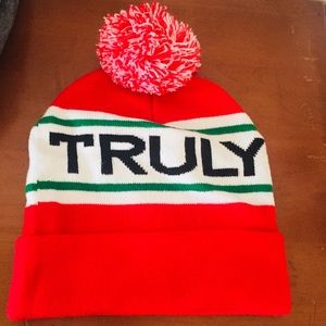 Truly Hard seltzer red winter hat with Pom Pom